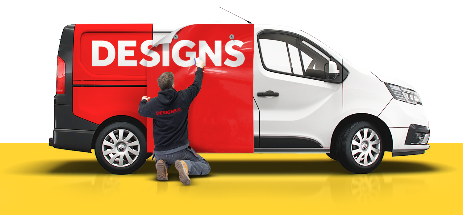 Designs employee fitting custom vehicle graphic.
